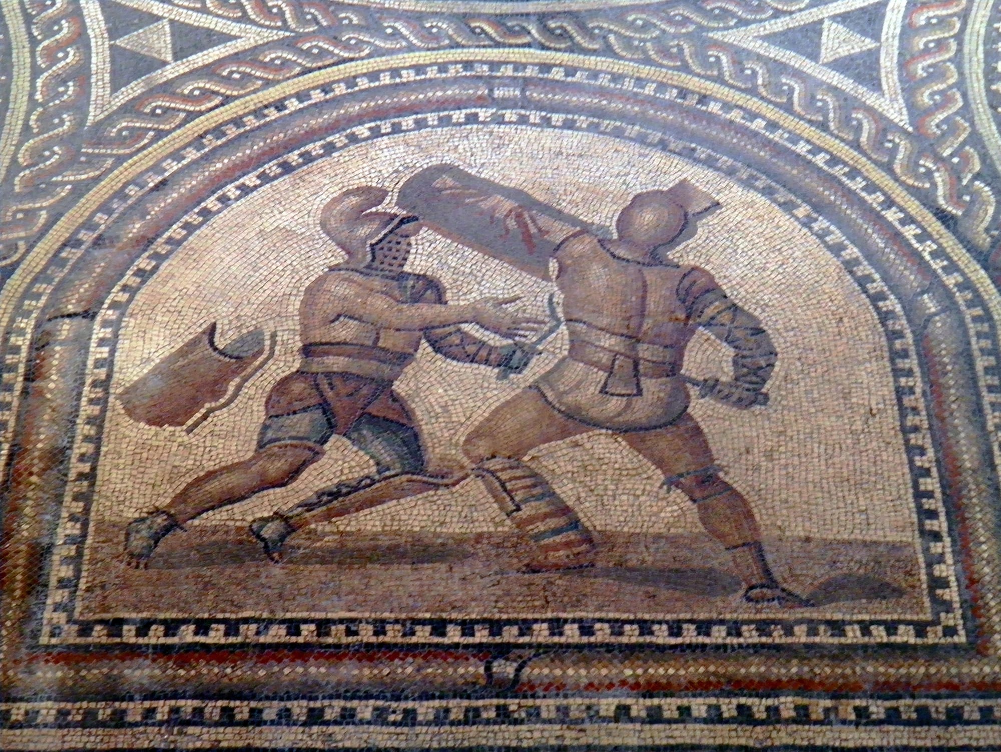 Detail of Gladiator mosaic, a Thraex (left) fighting a Murmillo (right), Römerhalle, Bad Kreuznach, Germany.