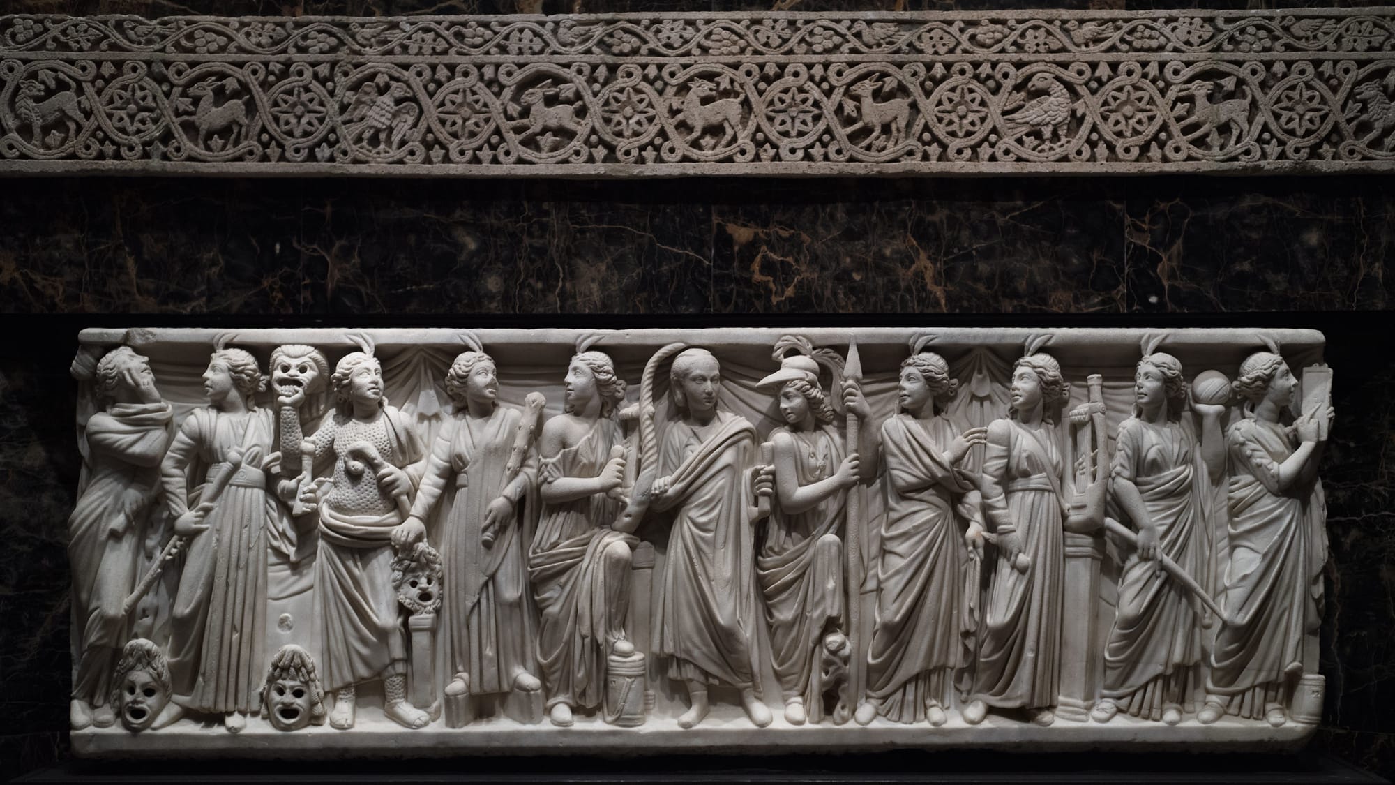 Roman marble sarcophagus with Muses