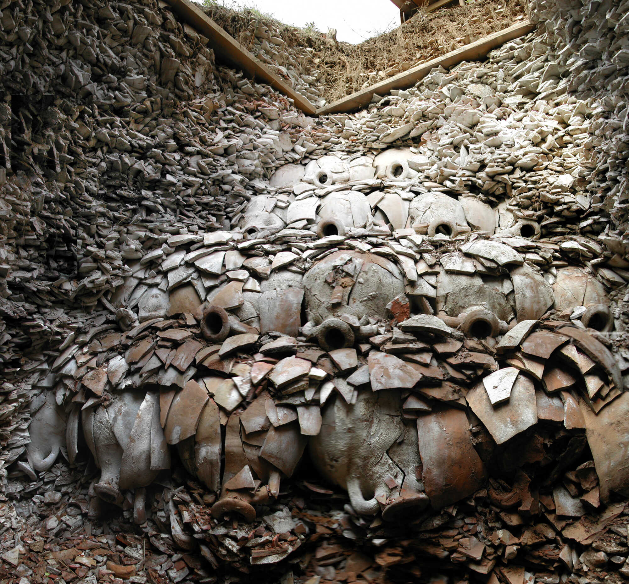 Excavations on the millions of amphorae at Monte Testaccio.