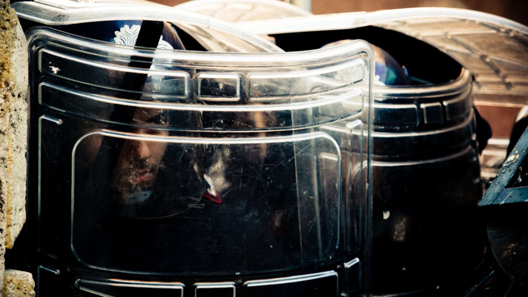 The use of the testudo formation, by modern riot police forces