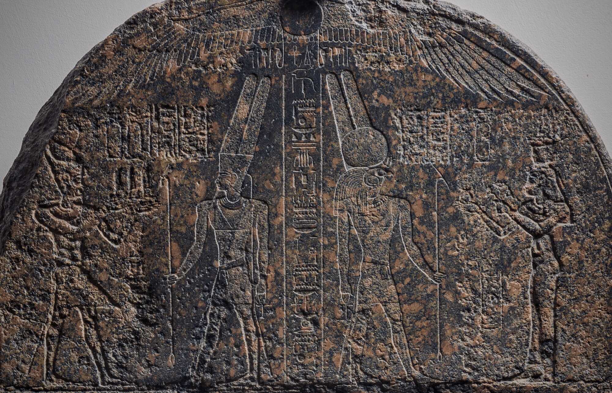 A detail from the granite stela made to honor general Callimachos, picturing Cleopatra and Caesarion.