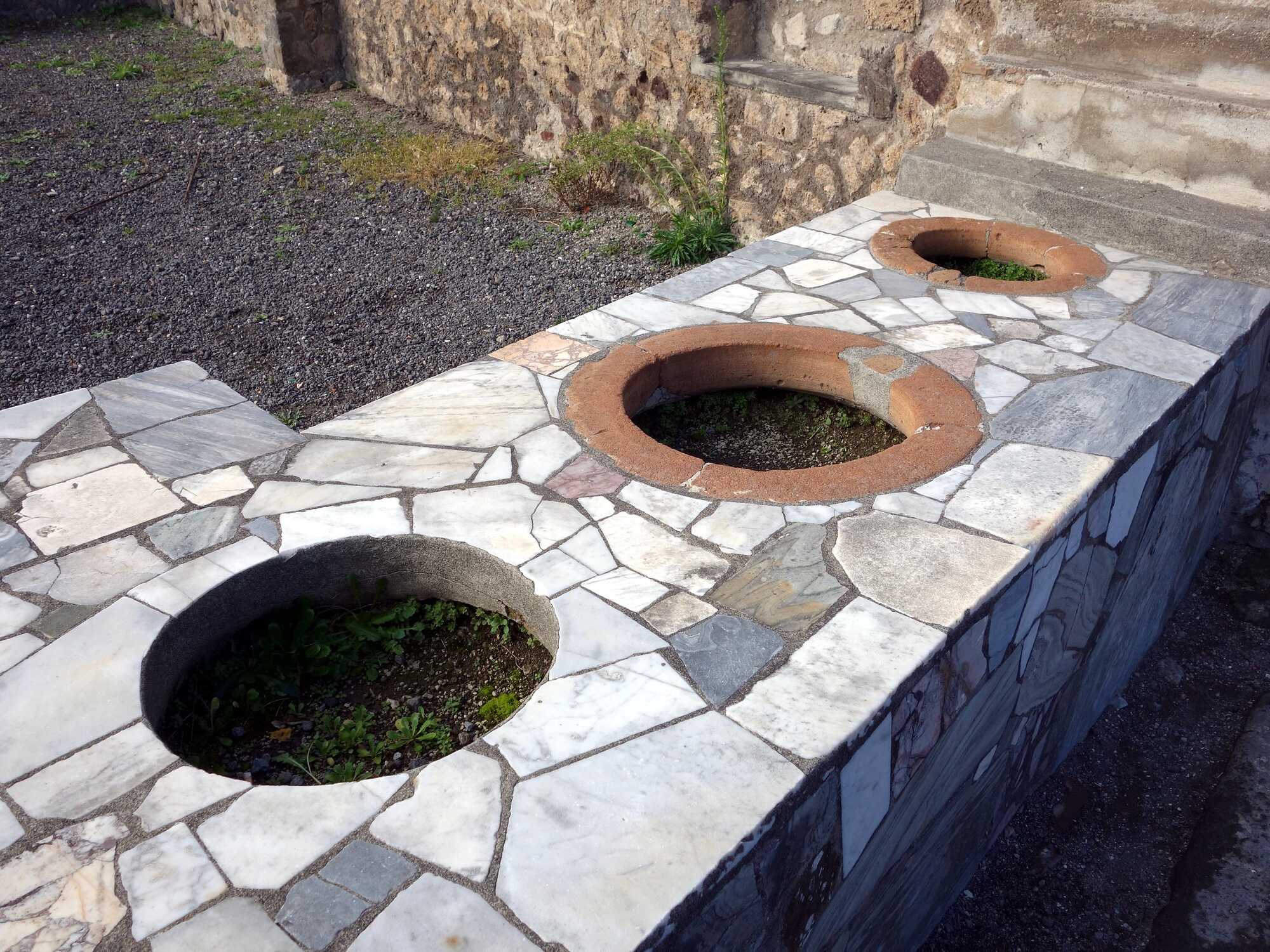 Three-seater Roman toilets.