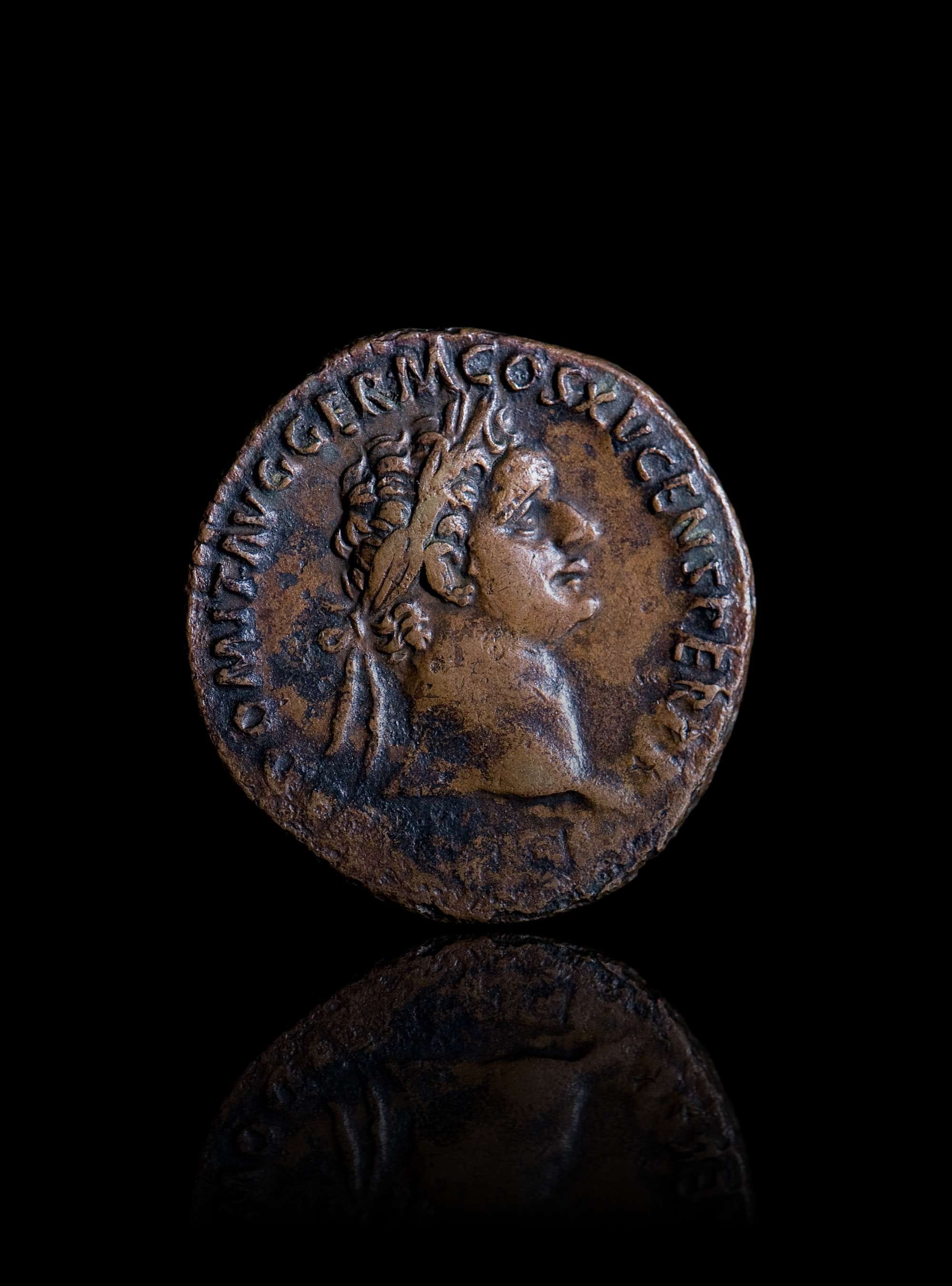 Ancient Roman coin with Emperor Domitian