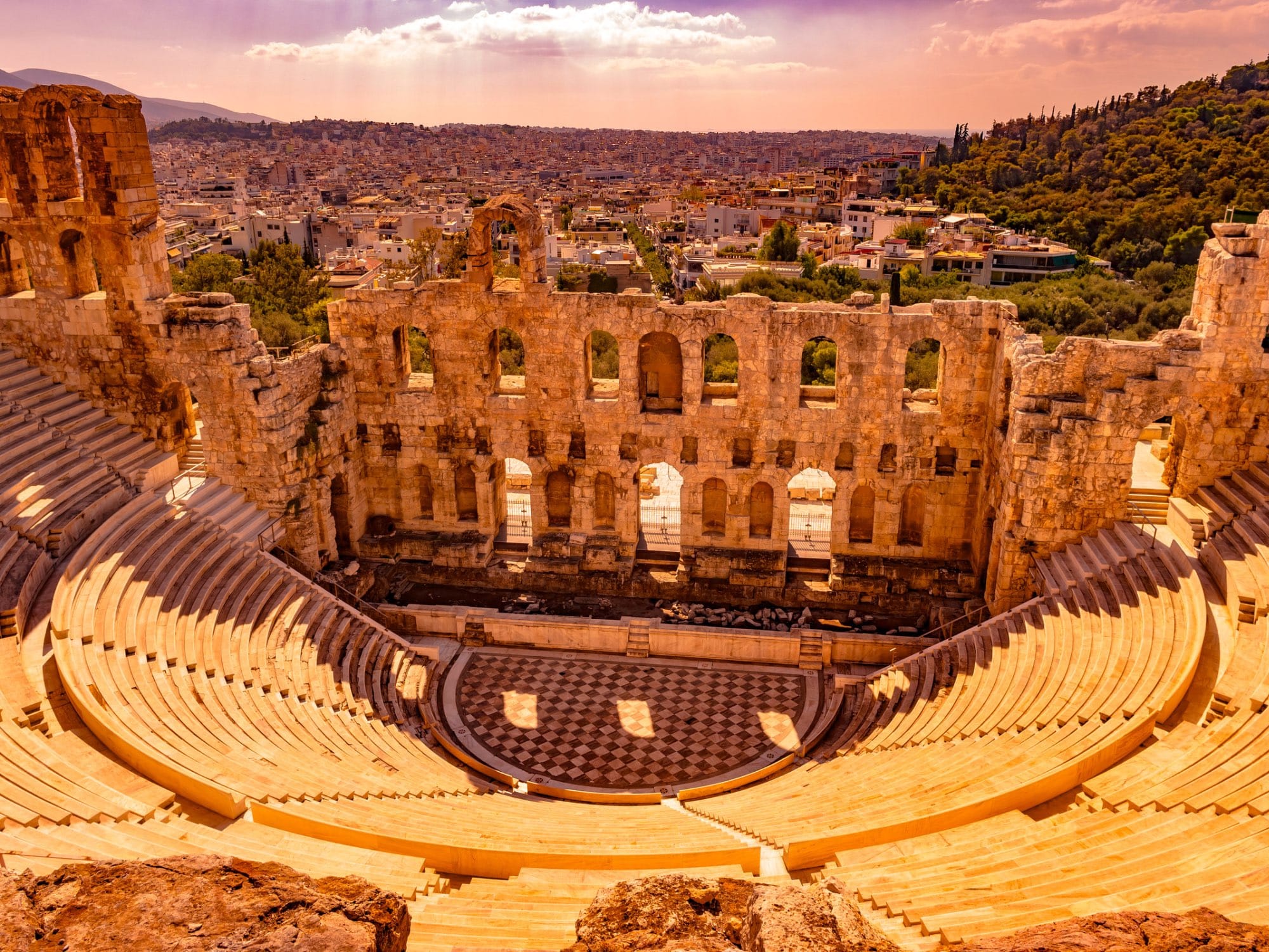 The modern Odeon of Herodes Atticus in Athens during sunset. 