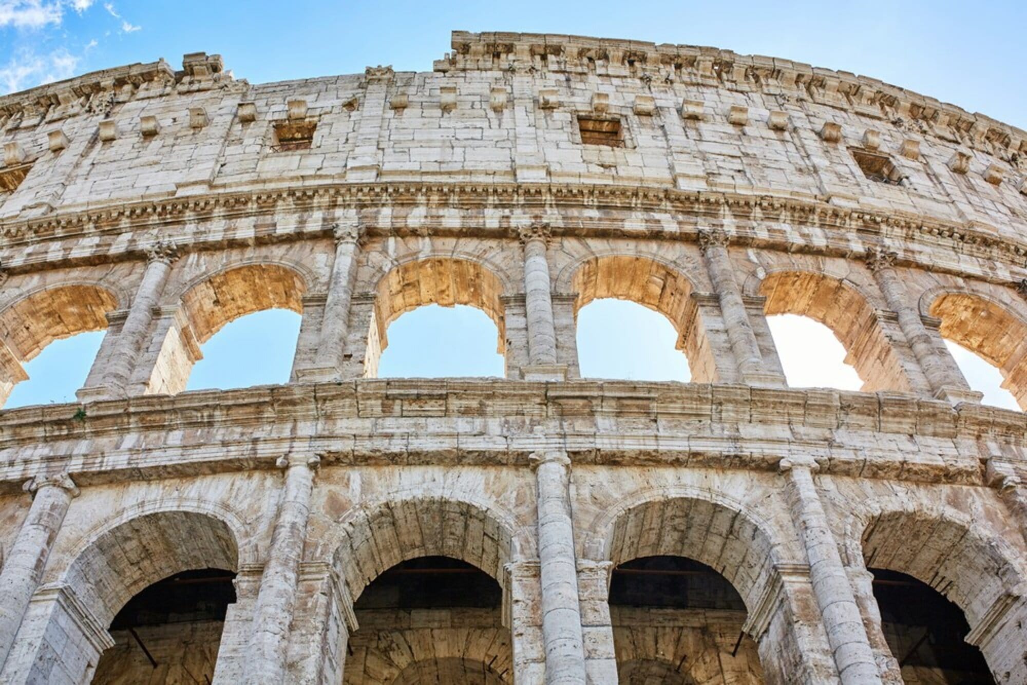 A close-up of the magnificent Colosseum arches.