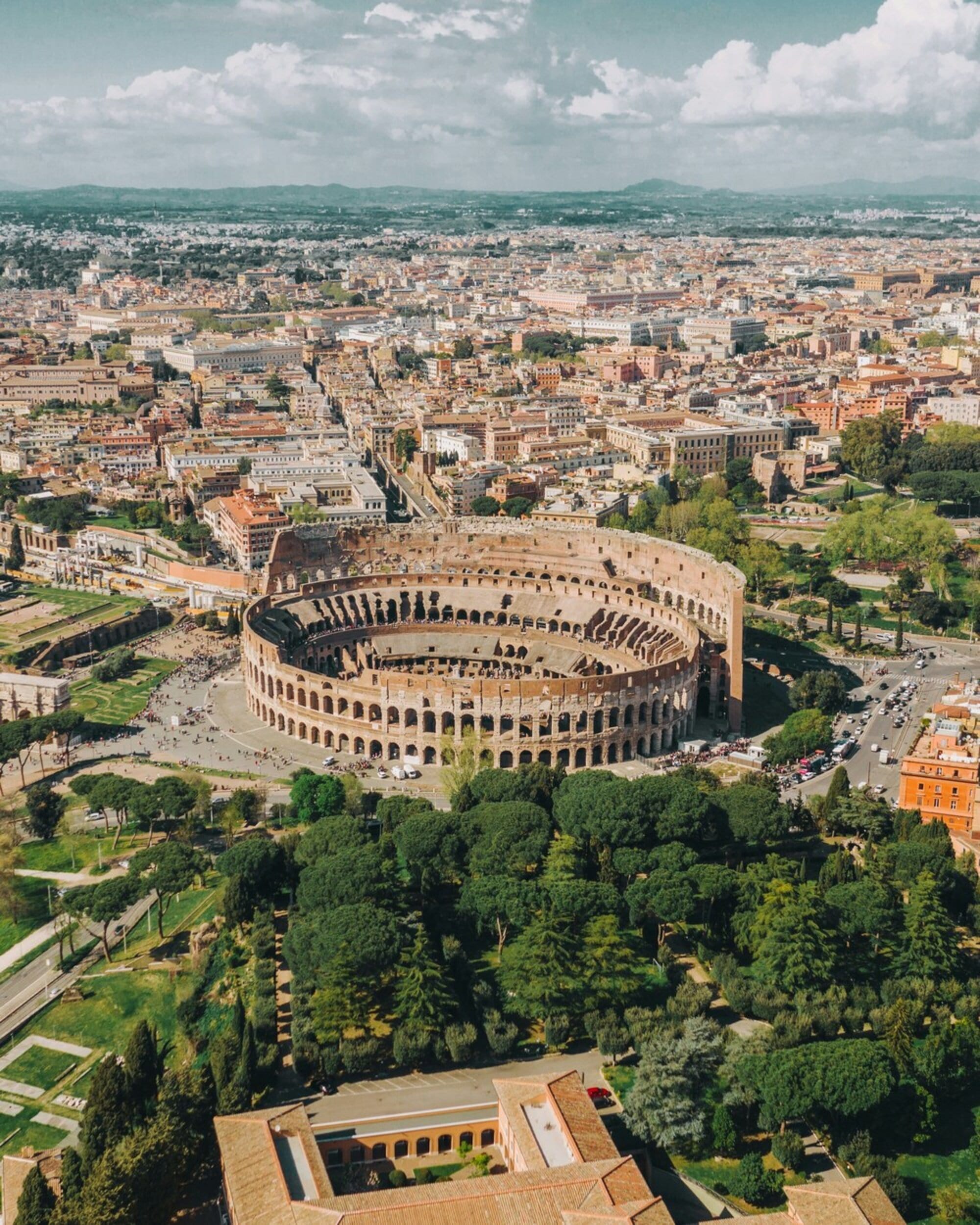 A drone shot of the Colosseum in Rome