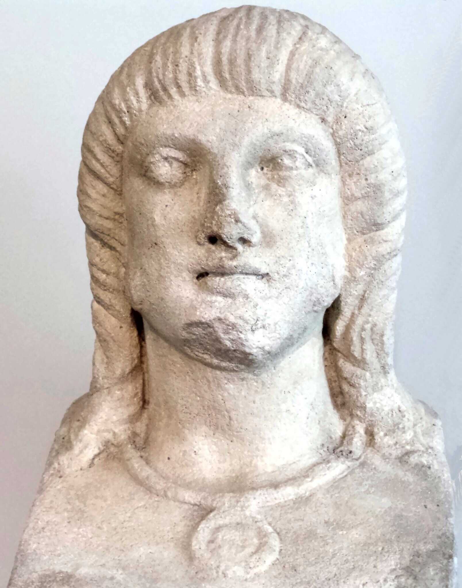 A probable representation of a Germanic slave around the year 375 AD, wearing a slave collar and tag