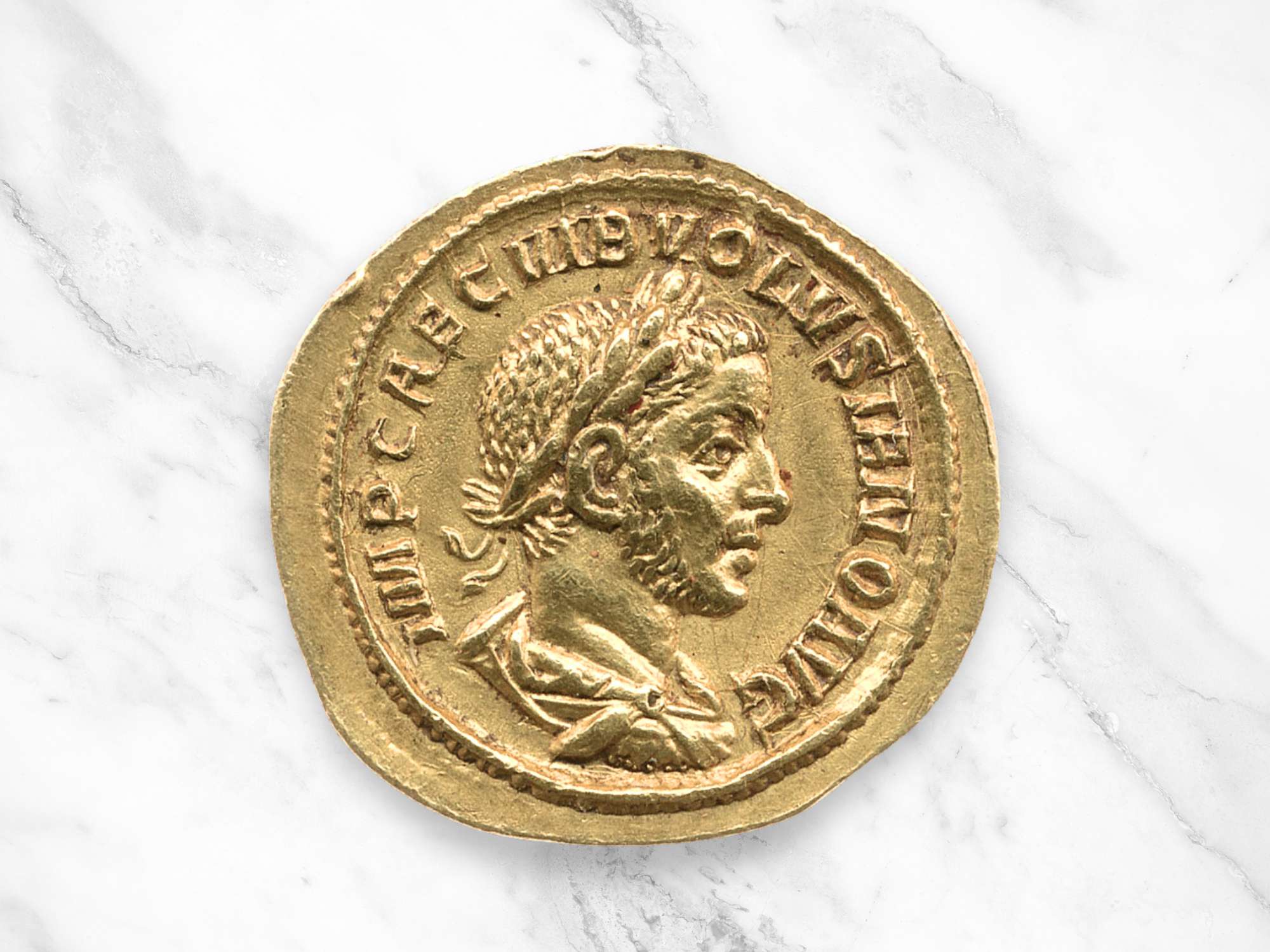 A gold aureus Roman coin of Emperor Volusianus