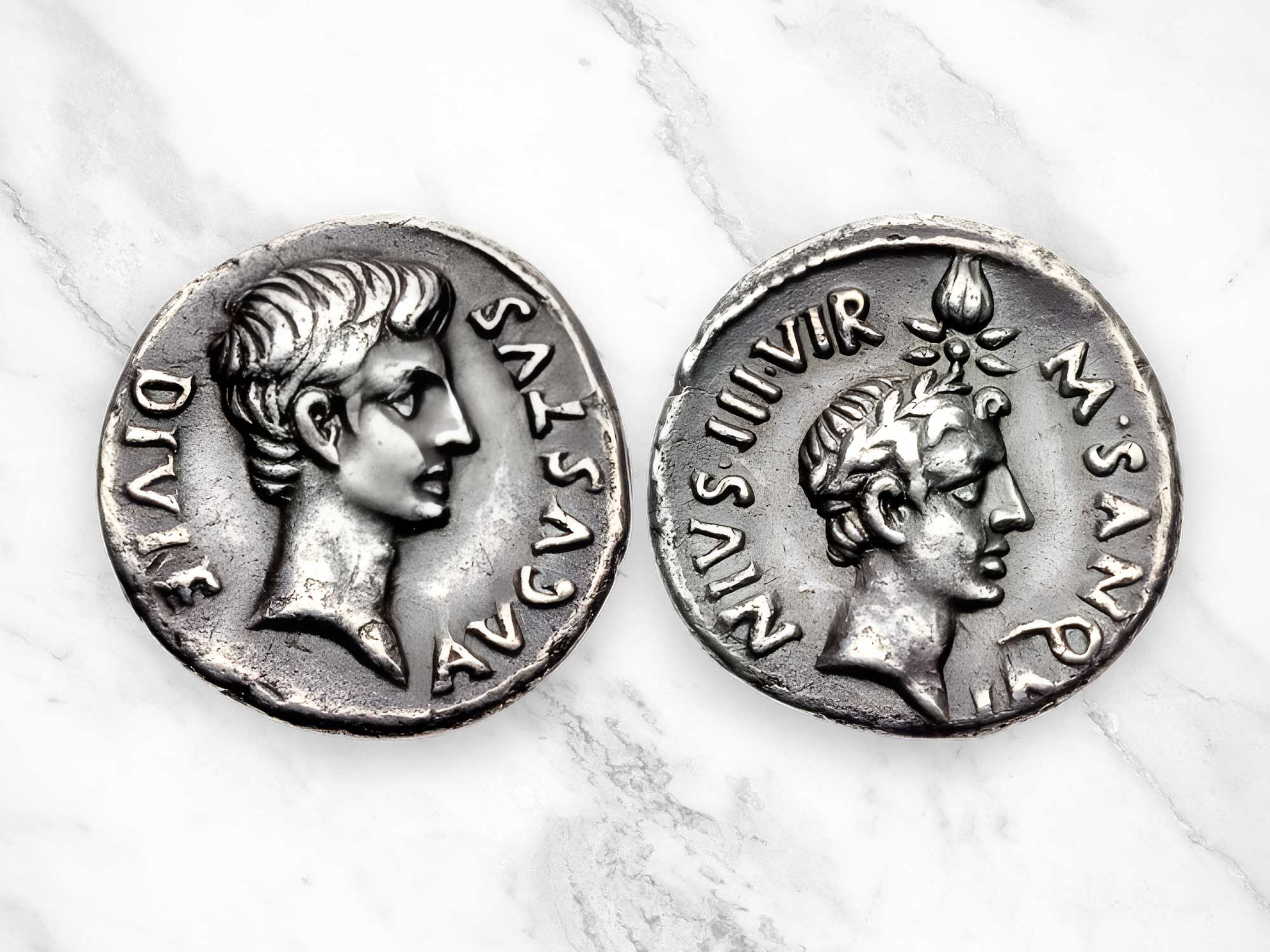 Rare denarius of Octavian & the youthful, laureate head of deified Julius Caesar right; above, a comet with four rays and a tail