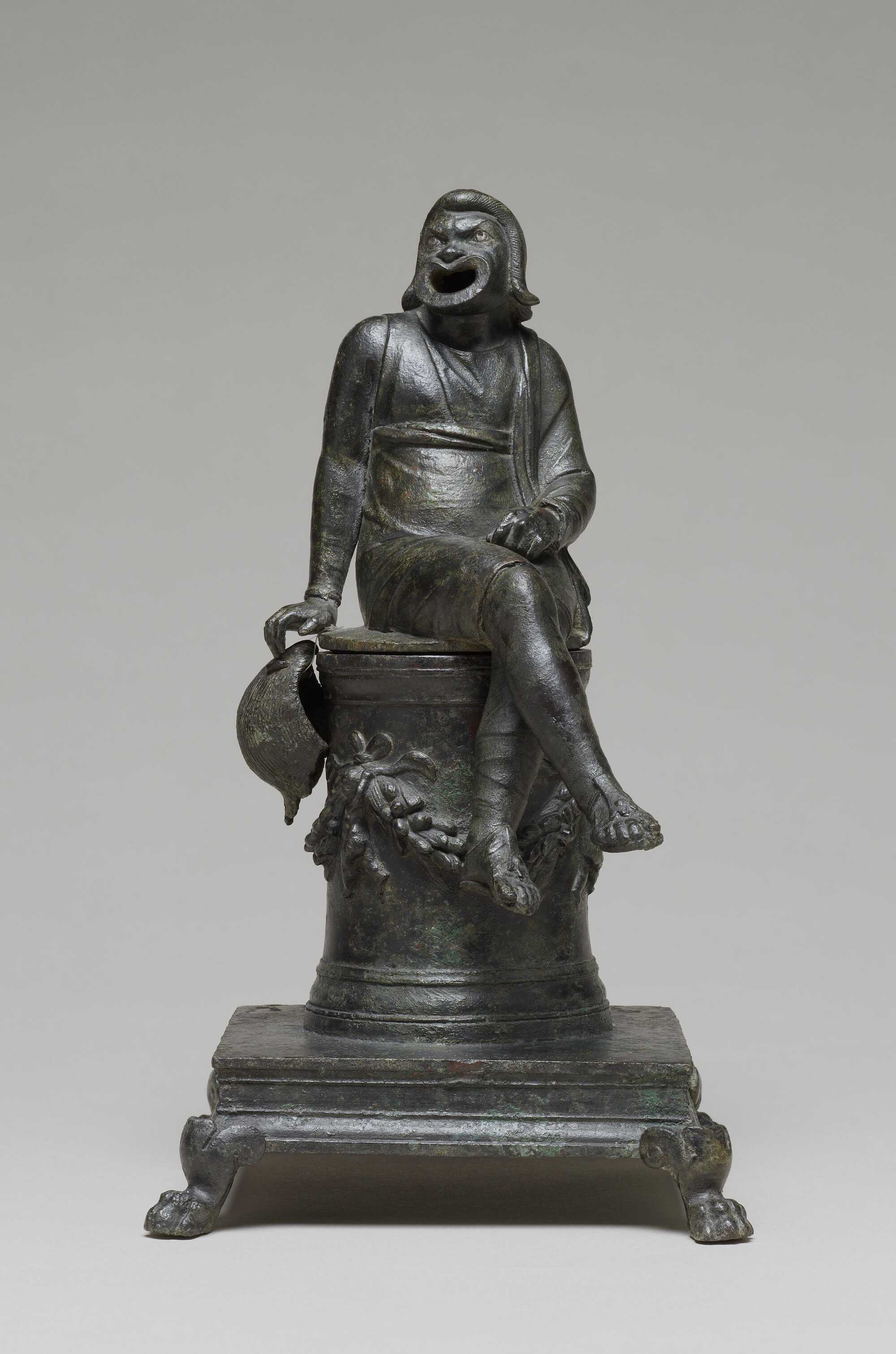 Thymiaterion in the Form of a Comic Actor seated on an Altar and a Separate Theatrical Wig, from the Roman period