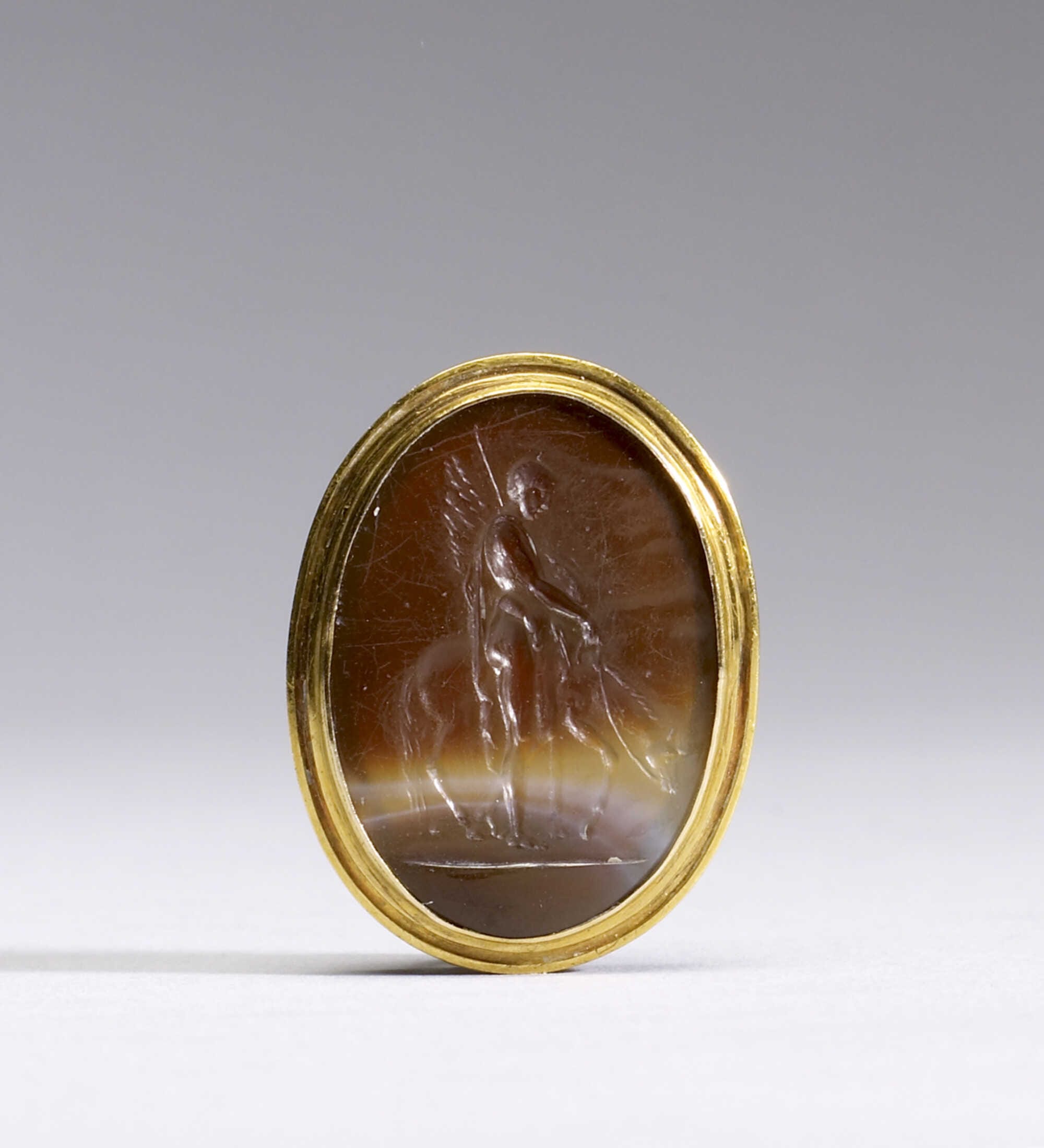 Gem with Intaglio with Bellerophon and Pegasos. Gem engraving was a major art form in ancient Greece and Rome. Precious stones were thought to have healing and protective powers and were used as amulets and seals as well as jewelry.
