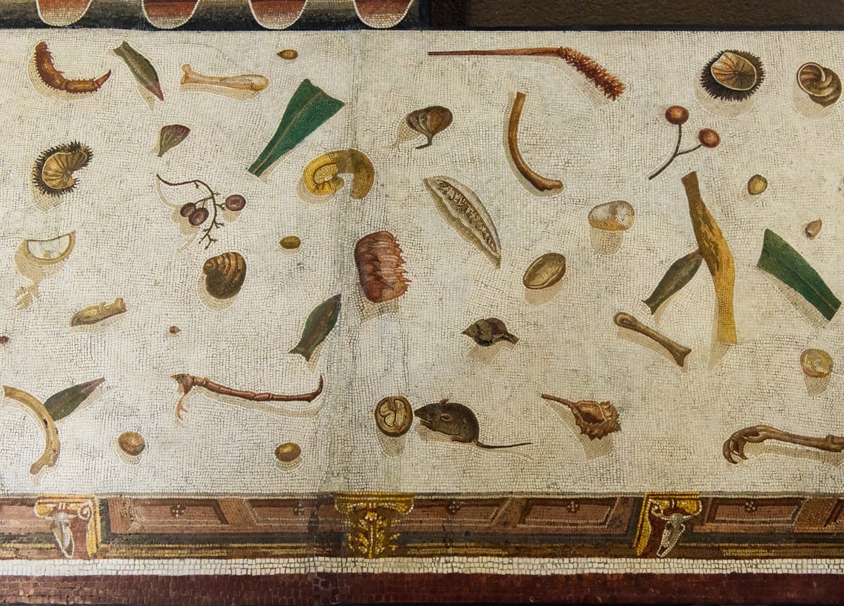 Asarotos Oikos mosaic: The unswept floor of the Roman elite
