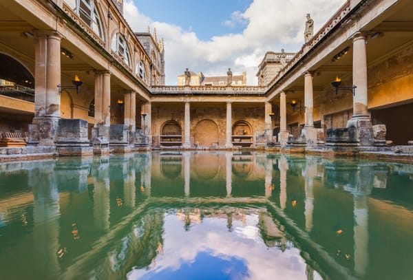 View of the Great Bath, part of the Roman Baths complex, a site of historical interest in the city of Bath, England