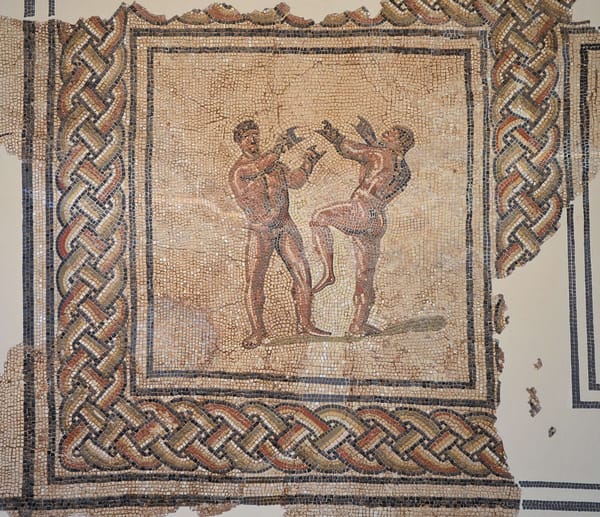 A mosaic fragment depicting two boxers with oddly shaped boxing gloves, 300-350 CE