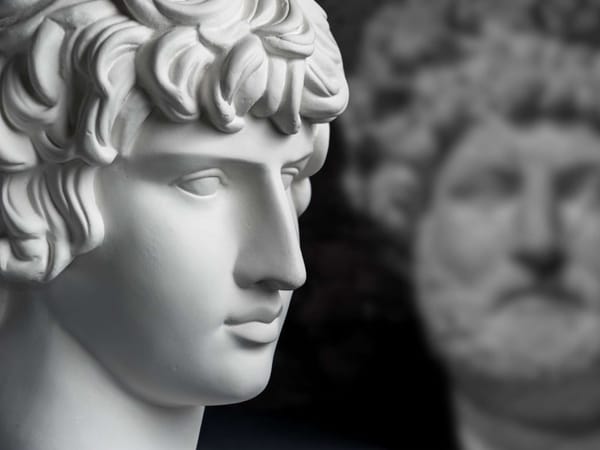 A modern bust of Antinous, Emperor Hadrian’s bust in the background